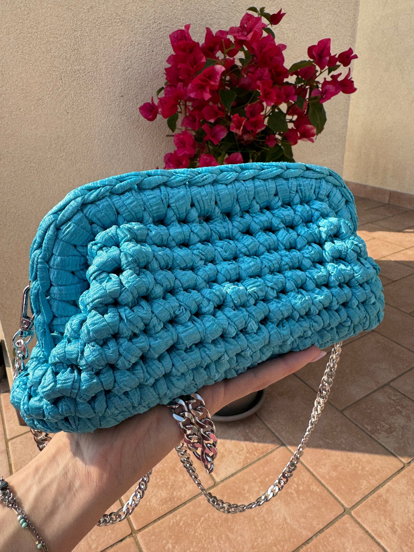 Borsa clutch con tracolla