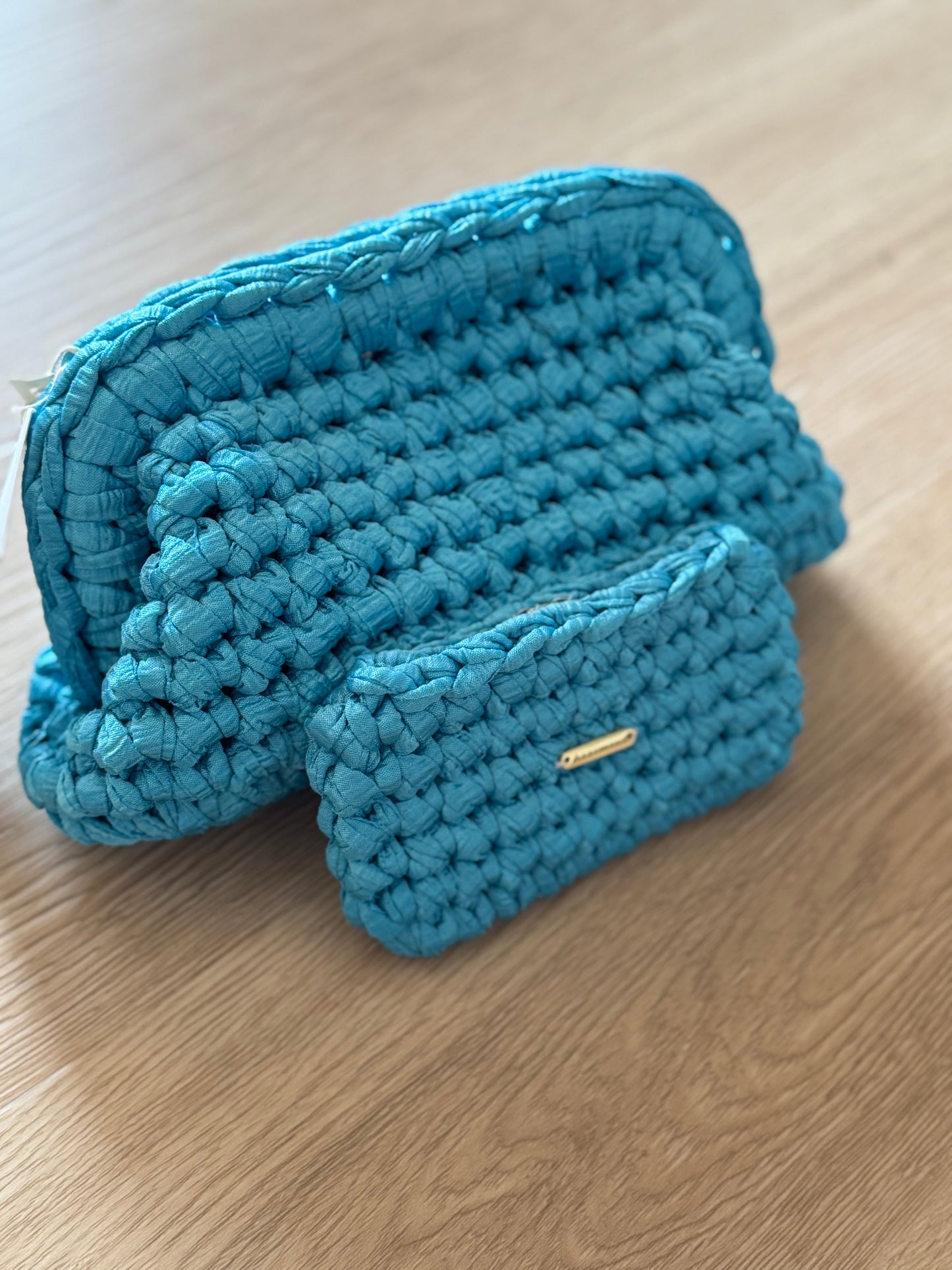 Borsa clutch con tracolla